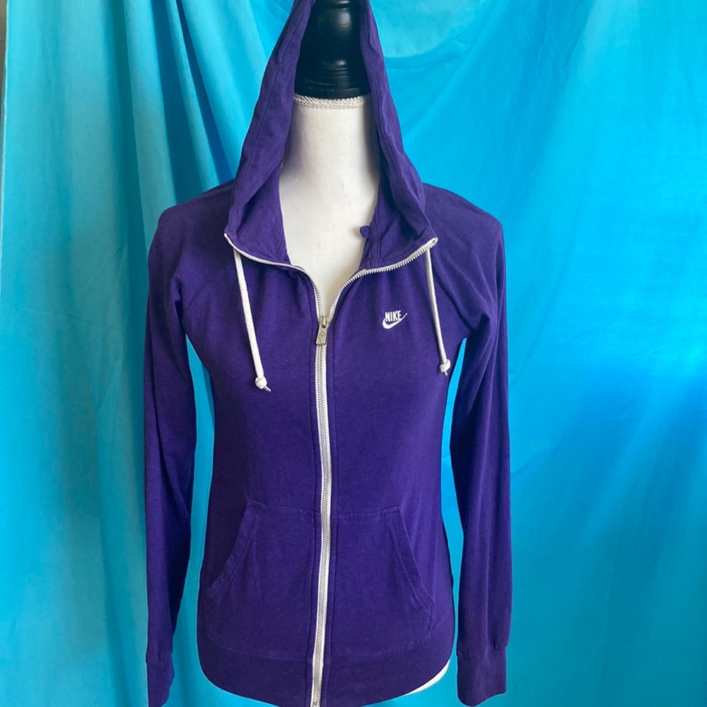 Buy2items get1 free.3/$20items for$40. Purple zip up Nike athletic jacket.